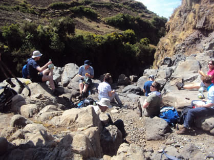 Group resting during a long trek to Sankaber